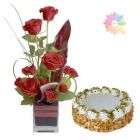 12 RED ROSES ARRANGED IN GLASS VASE WITH 1 POUND BUTTERSCOTCH FRESH CREAM CAKE