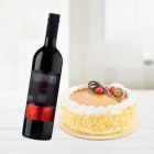 BUTTERSCOTCH CAKE WITH BOTTLE OF RED WINE