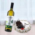 RUM N RAISIN CAKE WITH BOTTLE OF WHITE WINE