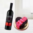 STRAWBERRY VANILLA COCKTAIL HEART SHAPE CAKE WITH BOTTLE OF RED WINE